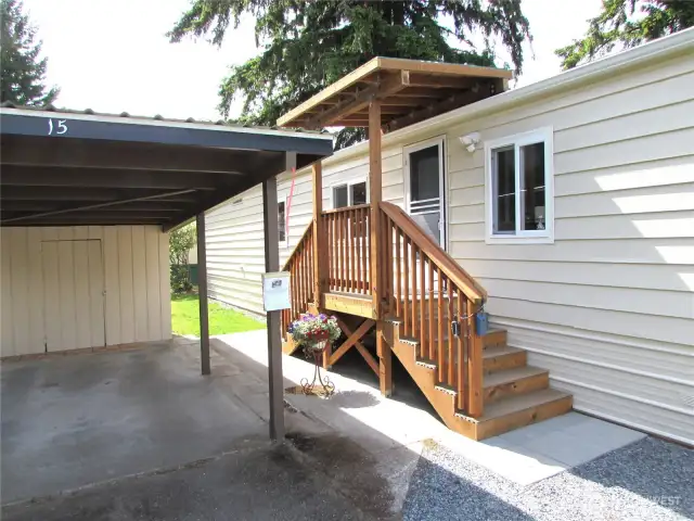 NEW FRONT COVERED DECK LEADS TO BACK YARD OR PARKING.