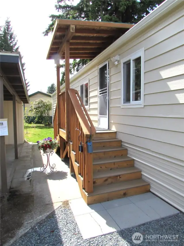 NEW DECK STEPS ARE TREX, LOW STEP HEIGHT TYPE.