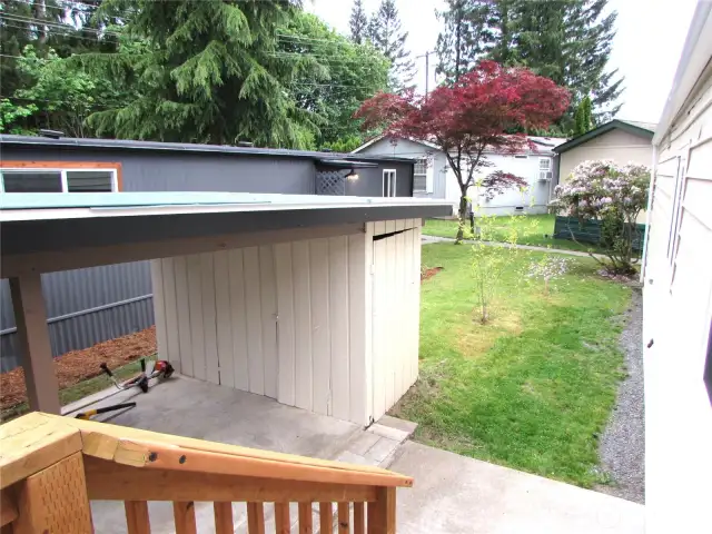 BACK YARD AREA HAS ROOM FOR GARDEN (GOOD SOUTHERN EXPOSURE) AND BACK SIDEWALK GOING TO LEFT LEADS TO COMM. DUMPSTER/ YARD WASTE & RECYCLING).