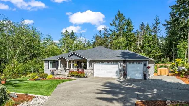 Built in 2022, this home is a show-stopper!  Plenty. of room on this level acre lot that is completely landscaped. Come take a look!