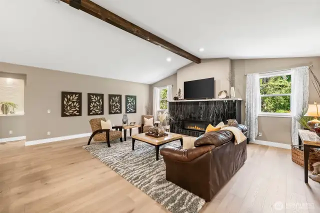 Great room with marbled fireplace to keep you cozy on cool evenings