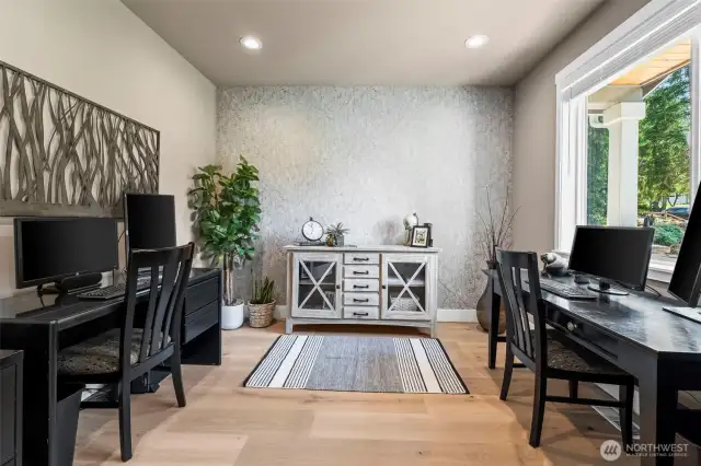 The office features a large window letting abundant light in and enough room for two desks!