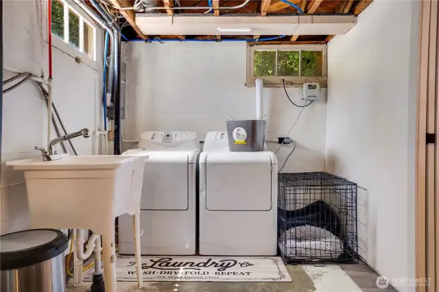 This well-equipped laundry area is ready for you! The utility sink is in place and just needs to be connected—making everyday chores even more convenient
