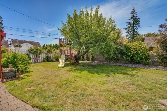 A 2024 refresh of the backyard included the addition of flower bed landscape liner, river rocks, and newly planted trees that enhance privacy, charm, and curb appeal.