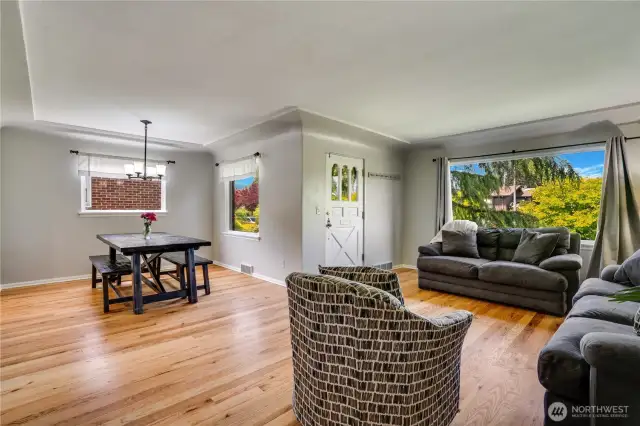 An open floor plan is fantastic for hosting, keeping the flow easy and inviting for guests. Fresh paint and refinished hardwood floors give it such a polished and welcoming feel designed for comfort, style, and good company.