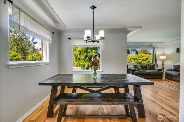 Sun-filled windows framing picturesque landscaping create such a peaceful ambiance, while a spacious dining room sets the perfect stage for gatherings, laughter, and memorable meals.