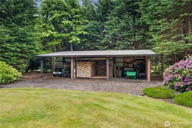 Three Stall Woodshed/ Storage Shed  16’ x 26’ 29-gauge colored steel chestnut brown metal building with classic brown metal roof  Gravel floor  Wood storage racks and shelving  Approximately 10 cords of firewood