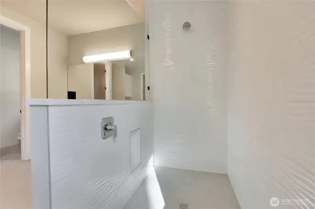 Large Primary Suite • Custom Tile Shower • Double Vanities • Custom Title Flooring