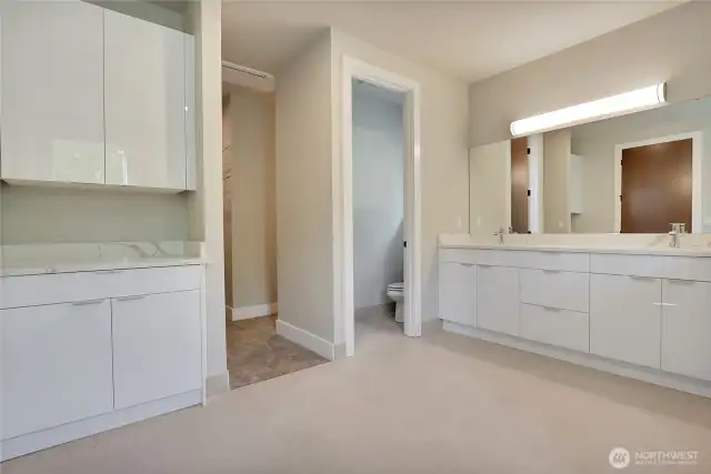 Double Vanities • Quartz Countertops • Luxurious Walk-In Showers