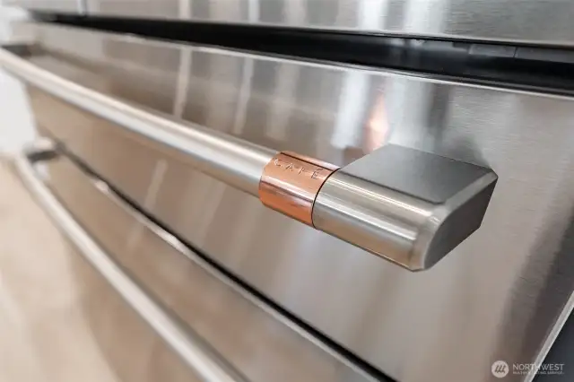 Kitchen is appointed with the "Cafe" Series appliances