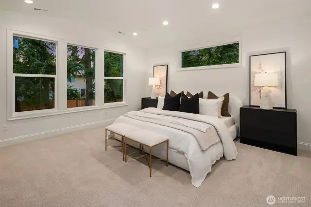Designer primary suite with five-piece bath with heated floors