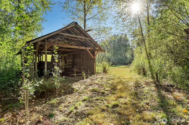 Convert this to a hang out space next to the meadow. A huge campsite!!