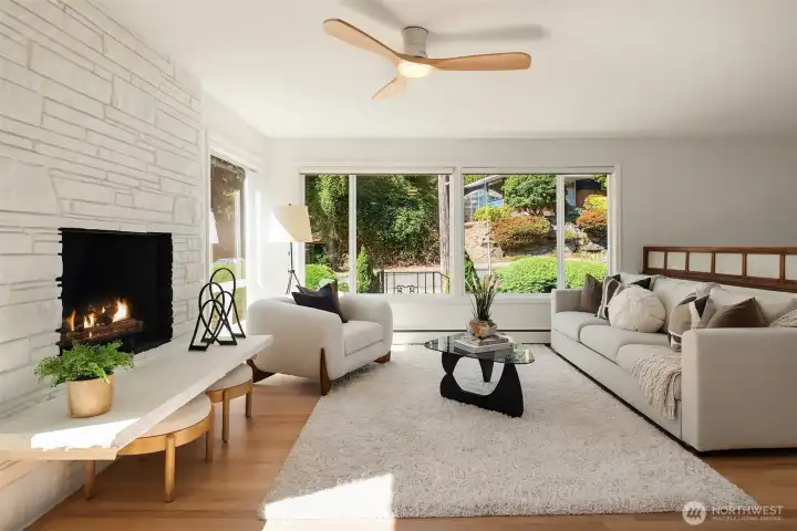 Beautifully refinished hardwood floors and a wood burning fireplace.