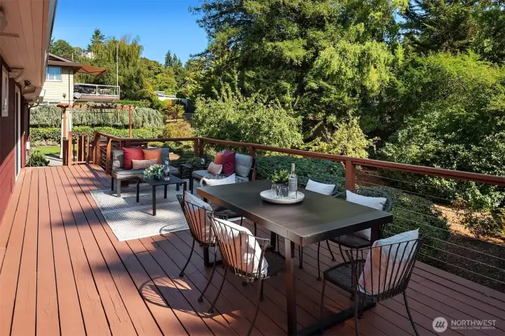 The deck spans the entire length of the house (minus the garage). Plenty of space to entertain your guests.