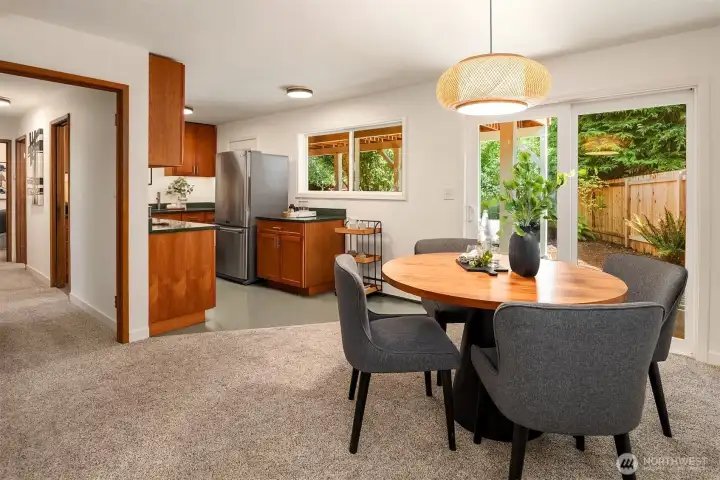 Sliders from lower level to large patio and gardens.