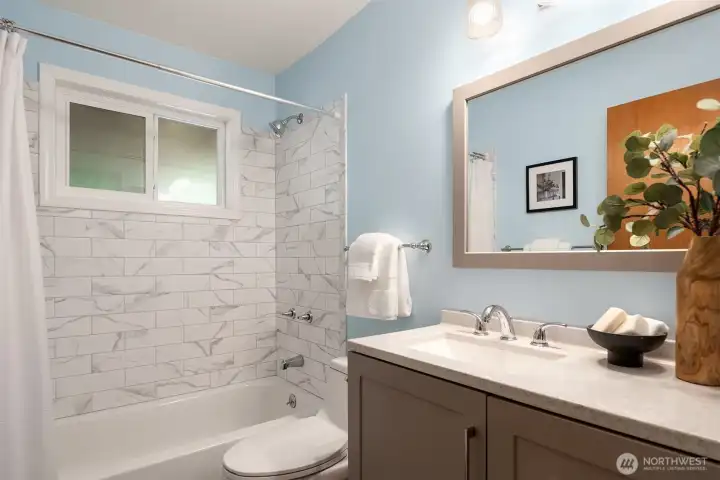 Refreshed lower level full bathroom.