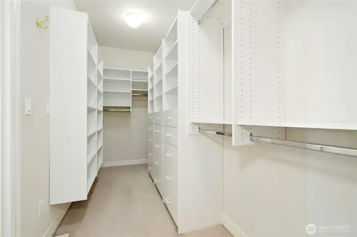 Just a small peek at the huge walk-in closet with organizers.