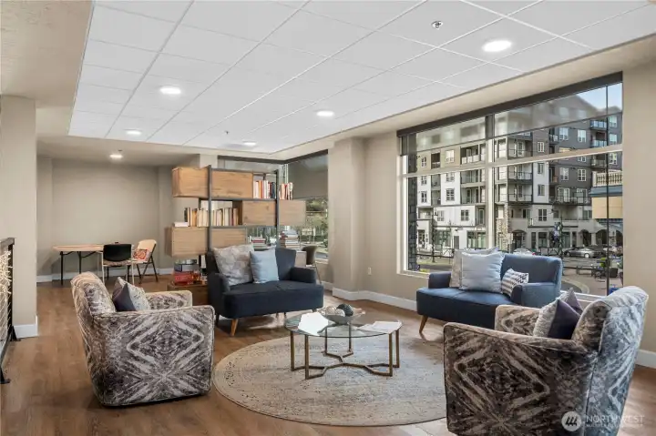This thoughtfully designed reading and conversation nook offers a quiet retreat within the building. With built-in shelving, plush seating, and floor-to-ceiling windows, it’s an ideal spot to work, unwind, or enjoy a good book.