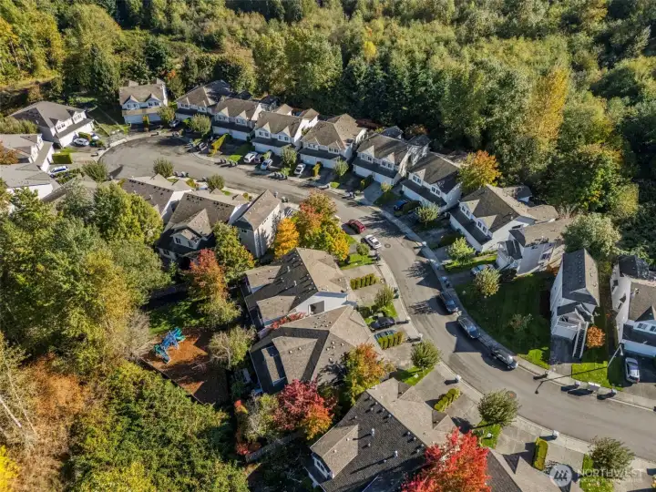 Community playground/park with nearby athletic court located a short walk across the street from unit. Community surrounded by greenbelt providing serene neighborhood views and sounds of nature.
