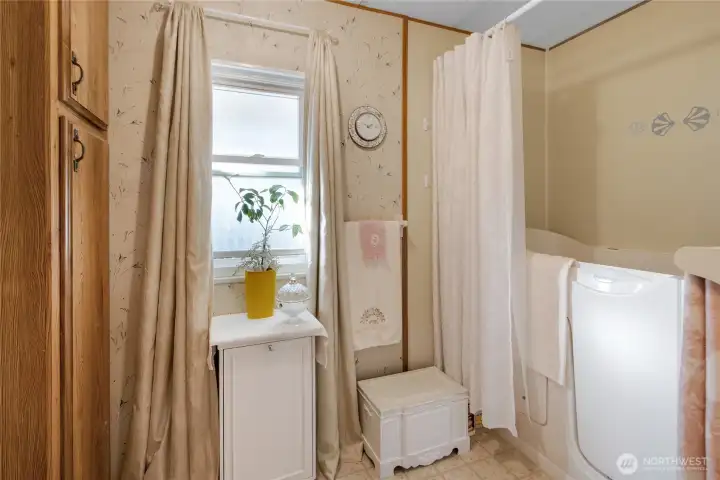 Primary bathroom with walk-in bathtub