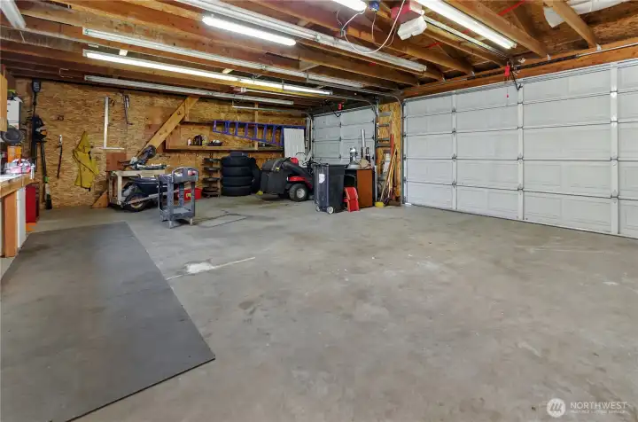 Every homeowner's dream! Large 3-car garage/shop