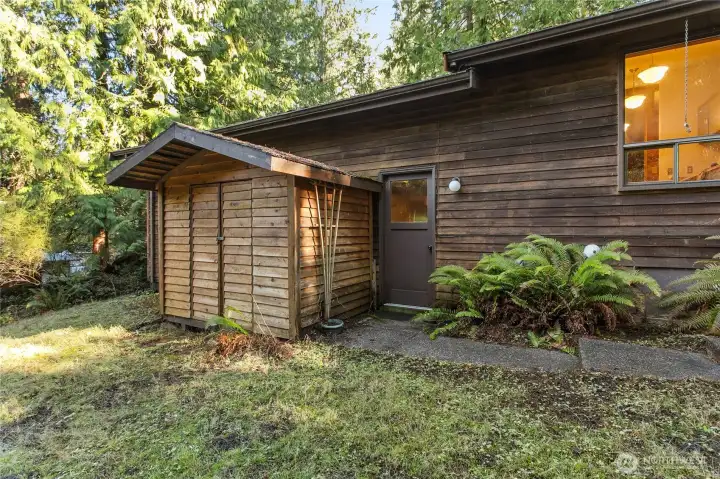 Storage shed and back access to garage