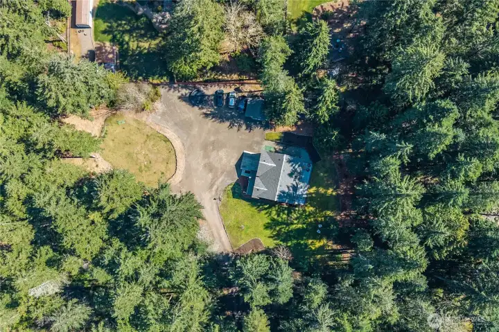 This versatile acreage is ideal for those dreaming of homesteading, entertaining, or simply enjoying a quiet, wooded escape.