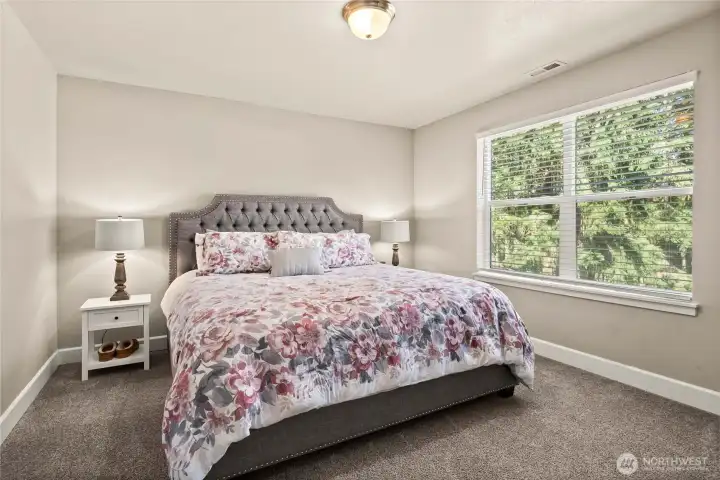 Bonus bedroom perfect for setting up as a guest room. Flooring is wall-to-wall carpet.