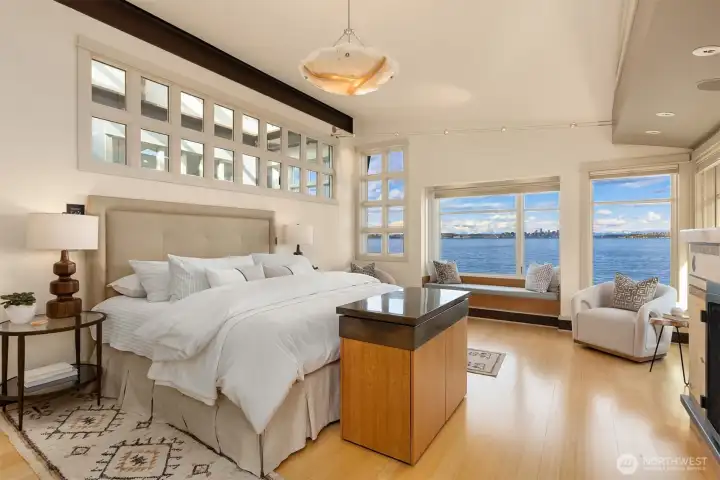 Unreal primary bedroom with epic views and gas fireplace.