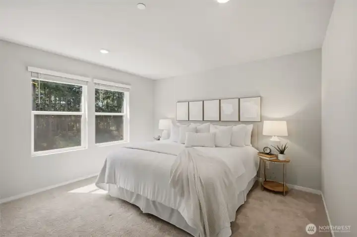 Bright & airy primary suite.