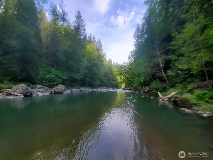 This calm pool is on lot 10 close to lot 11. All of the areas in the listing photos of the river and trails are accessible to the owner of lot 12 via the trail use easement.