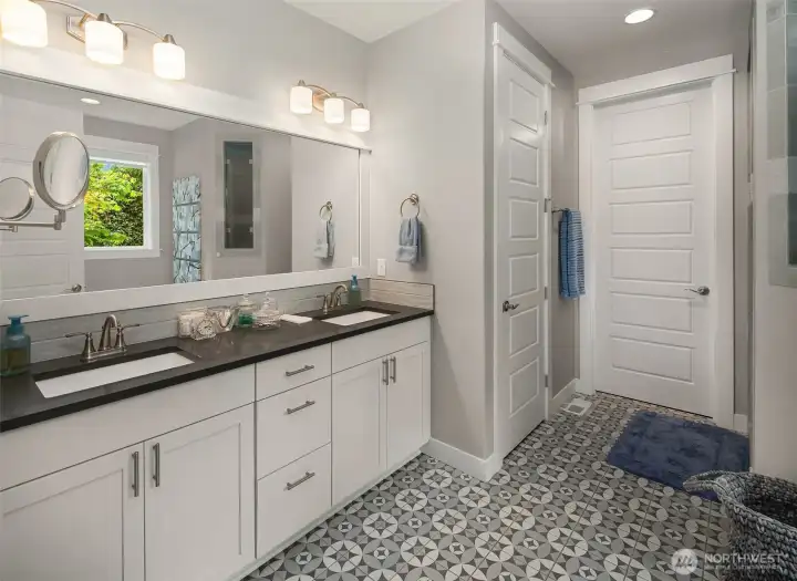 Very spacious primary bath leads to a large walk in closet Very spacious primary bath leads to a large walk in closet