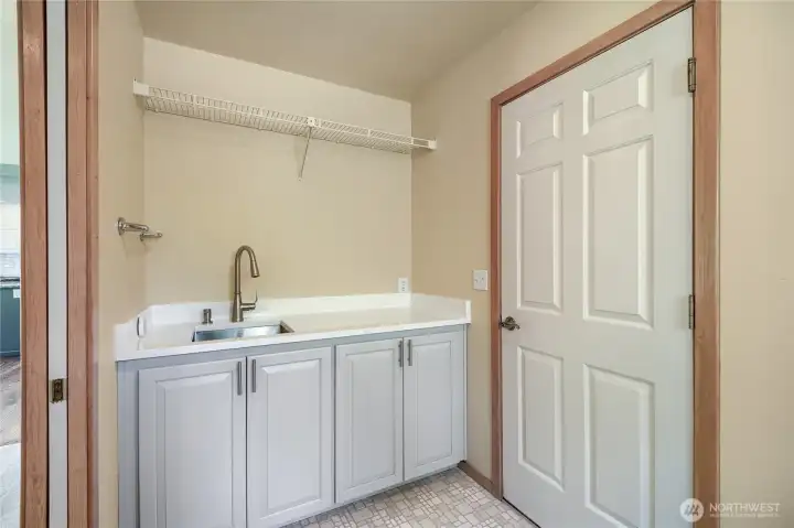 Super convenient wash sink off the garage in laundry room.