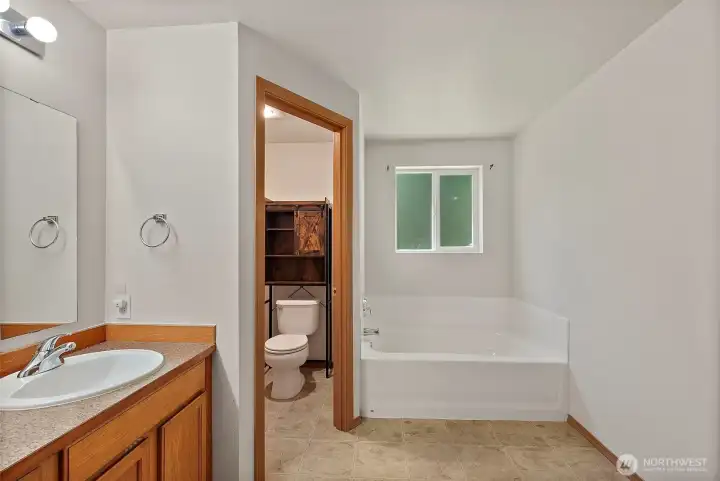 Shower behind, to the right.