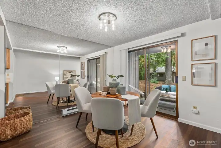 Separate dining area with slider to backyard covered patio.