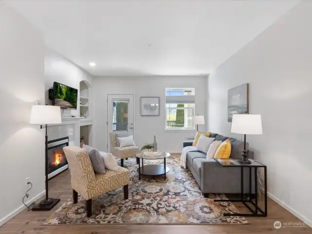 The gracious living room includes a beautifully finished gas fireplace for cozy evenings.