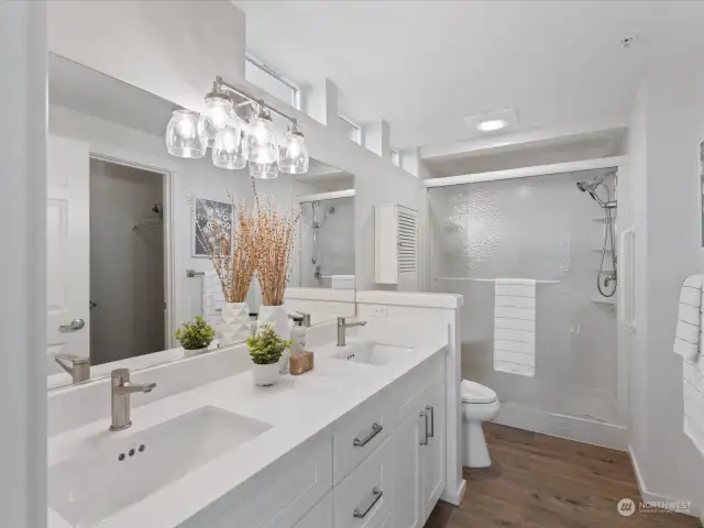 The suite includes this beautifully updated 3/4 bath with dual sink vanity and double sized shower.