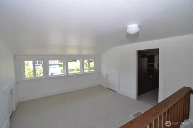 At top of stairs you'll find a flexible space - library, play room, exercise room. Whatever you can imagine!