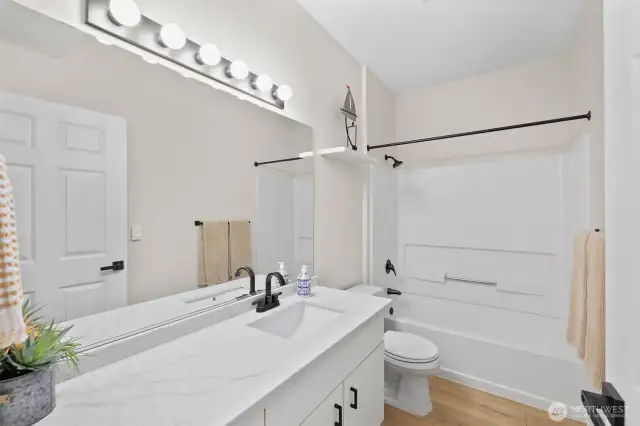 Main bath with under mounted sink on quartz counter