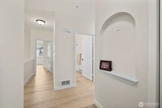 From the slate entry you can see the nice flow of the floor plan with 8' ceilings and NEW flooring throughout