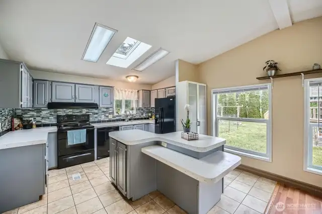 Beautifully updated kitchen is spacious and function in its design. Lots of storage throughout.