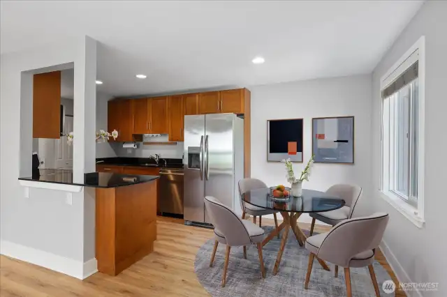 Pass-thru to let lots of light into the kitchen. Room for a table for 4.