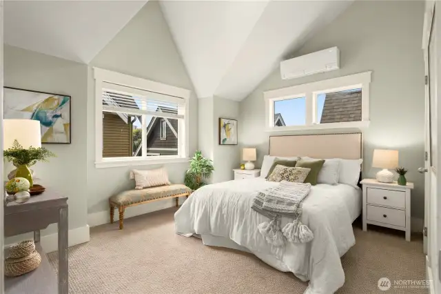 Second spacious upper bedroom also has vaulted ceilings and great light