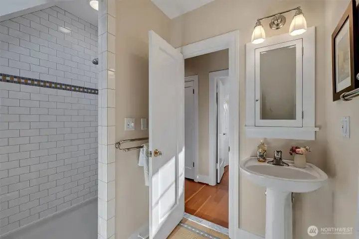 Upstairs has a 3/4 bath -- shower, toilet and sink.