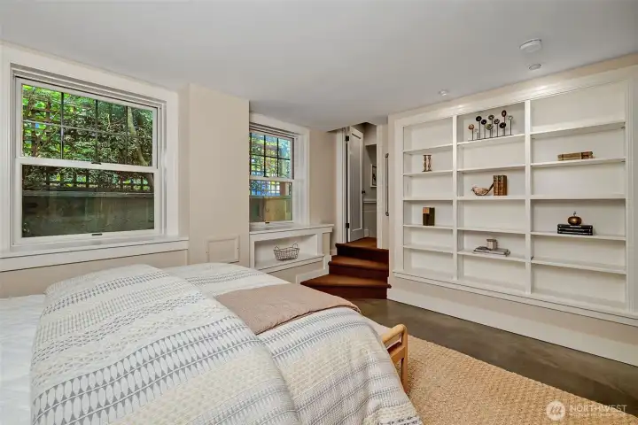 On the lower level, there is a spacious bedroom. It's perfect for long term guests. They will be happy to have their own floor and you will be happy to not have them underfoot.