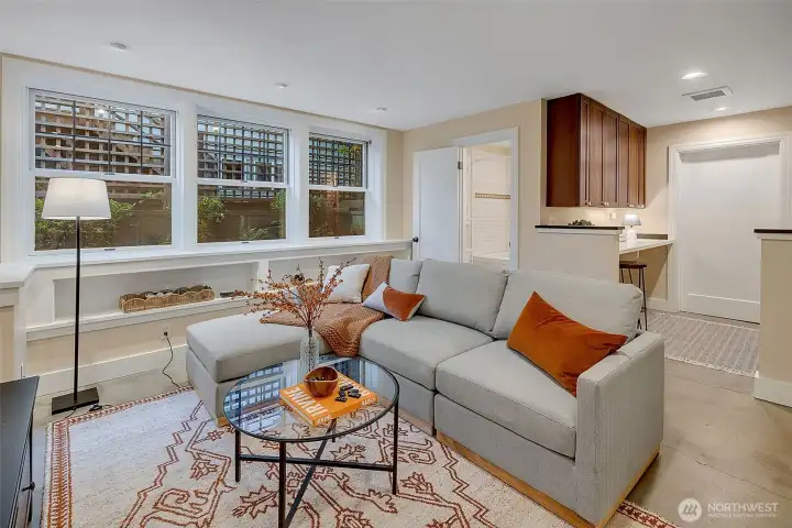 On the lower level, the family room leads to a laundry area and full bath.