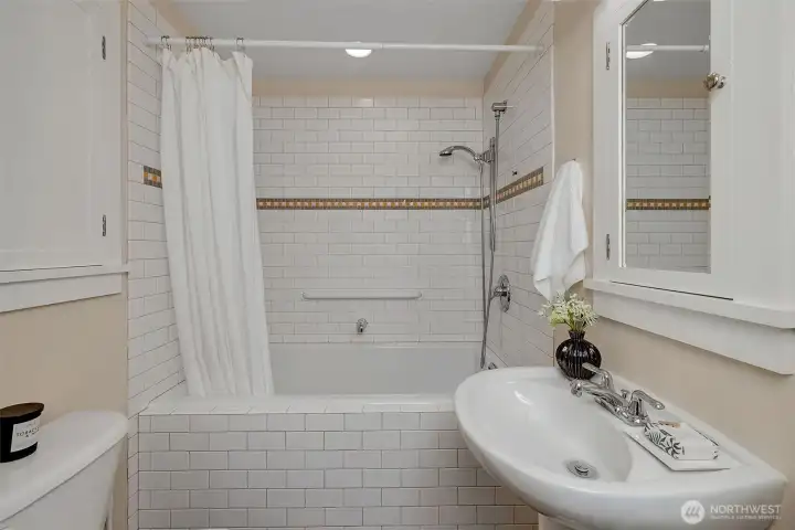 The lower level bathroom has a luxurious deep tub with the tap in the middle. Two can tub together.