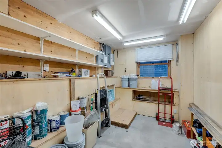 Heated shop/work space just off the mud room/bicycle garage is great for all kinds of projects.