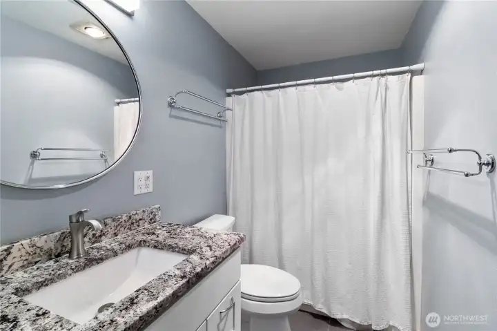 The Main Bath is completely renovated.