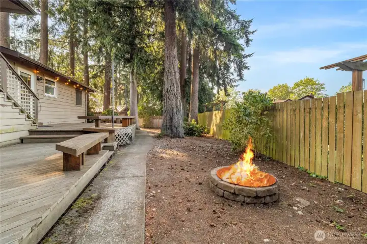 Enjoy a warm fire on those chilly nights with the fire pit in the back yard.